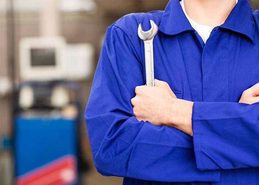 Person Holding Wrench